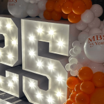 Murray Building Services 25 years celebration, lights and balloons.